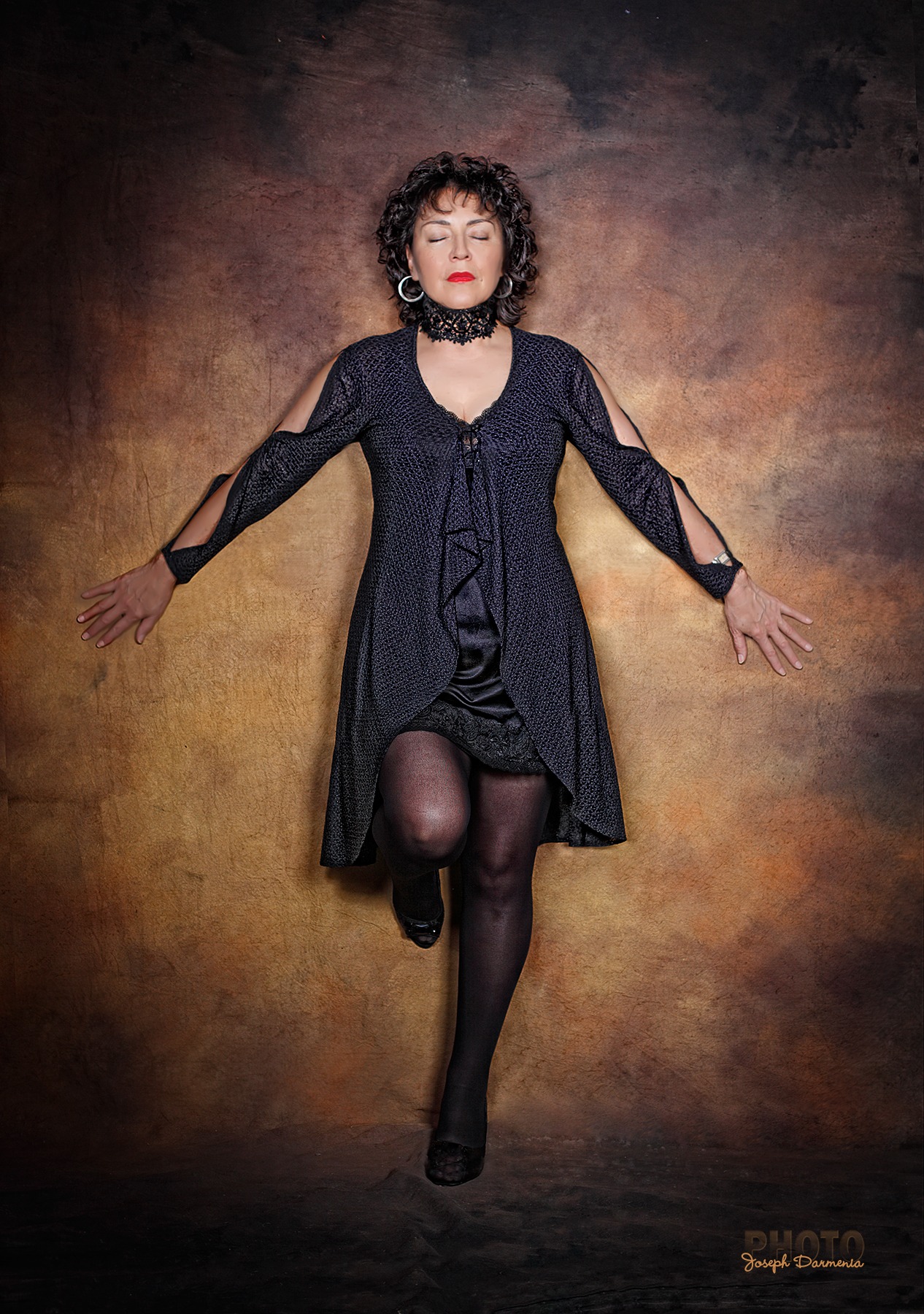 Ruby Page in a reflective full-length portrait